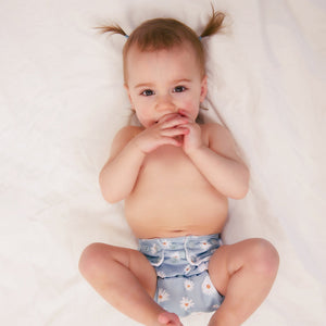 The Cloth Nappy Company Malta La Petite Ourse Pocket daisy on baby