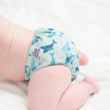 Load image into Gallery viewer, The Cloth Nappy Company Malta La Petite Ourse Pocket narwhal on baby